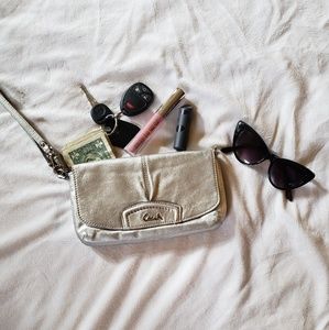 COACH wristlet- silver.